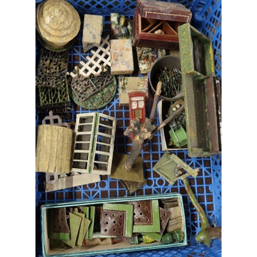 262 - A collection of Britains painted lead garden items, to include a greenhouse, rockery, wheelbarrow, f... 