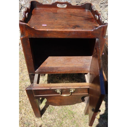 28 - A 19th century mahogany pot cupboard, of square form, with galleried top over a cupboard, with slide... 