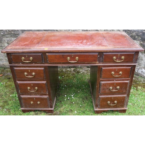 3 - A 19th century knee hole pedestal desk, fitted one long drawer, flanked by a short drawer to each si... 