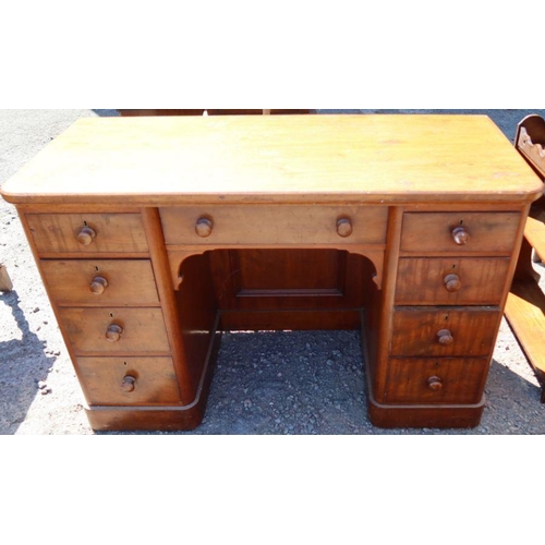 30 - A 19th century mahogany dressing table/desk, fitted with an arrangement of nine drawers around the k... 