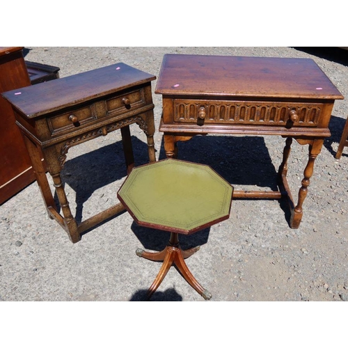 32 - A reproduction oak sidetable, with carved decoration to the frieze drawer, 30ins x 19ins x height 30... 