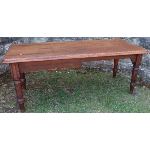 34 - An antique pine kitchen table, fitted with an end drawer, raised on turned legs, 74ins x 31.5ins x h... 