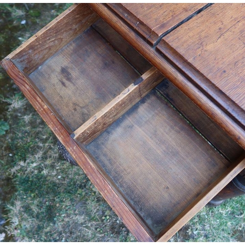 34 - An antique pine kitchen table, fitted with an end drawer, raised on turned legs, 74ins x 31.5ins x h... 