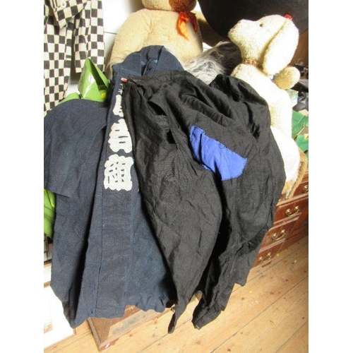 340 - A collection of vintage clothing, to include two tail coats, one in black and white cheque, a pair o... 