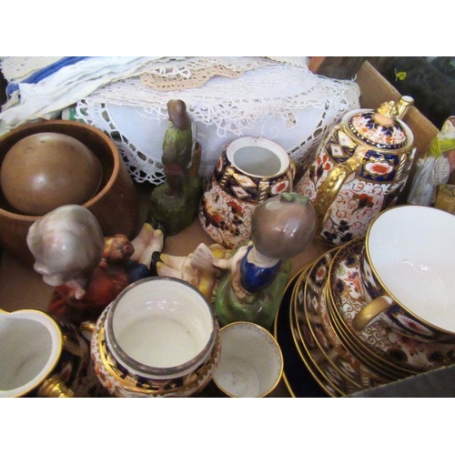 351 - A box of assorted linen and china to include Imari pattern items