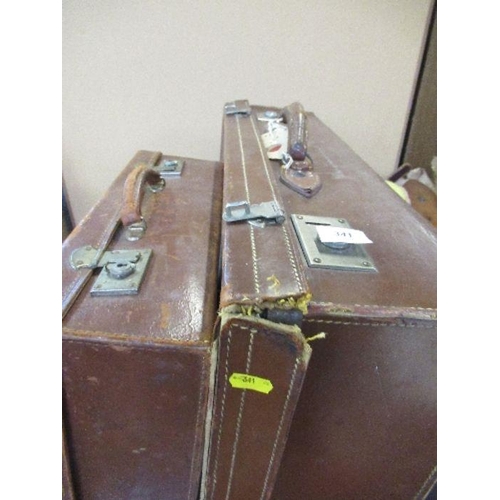 352 - Two leather suitcases