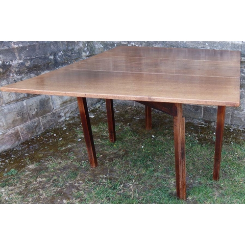 48 - An antique mahogany drop leaf table, of rectangular form, with swing leg, 57ins x 44ins x height 29i... 