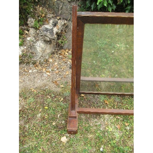 72 - A mahogany swing frame mirror