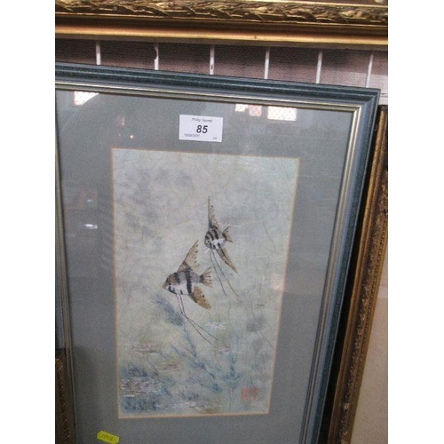 85 - An Oriental picture of two fish, 11.5ins x 6.5ins