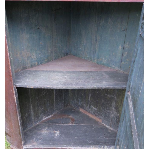 9 - A 19th century mahogany free standing double corner cupboard, the upper section having astragal glaz... 