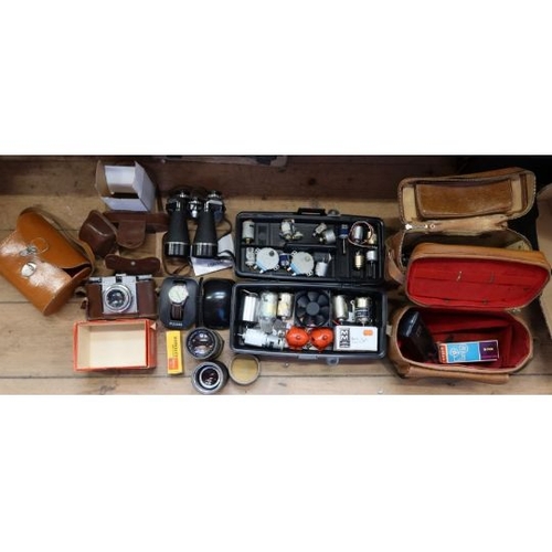 346 - A box of vintage cameras, binoculars to include Paxina camera, Pulsar watch, Regent binculars, Will ... 