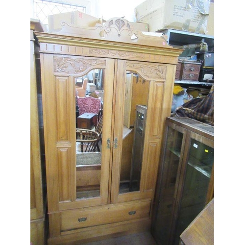 103 - A double mirror door wardrobe, satinwood. Width 45 ins, height 83 ins.