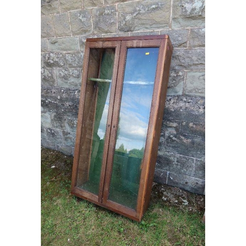 104 - A glazed gun cabinet (decorative purposes only)