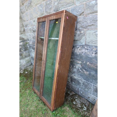 104 - A glazed gun cabinet (decorative purposes only)