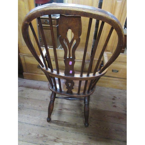 108 - Country yew wood  Windsor armchair, with pierced central splat, possibly cut down.