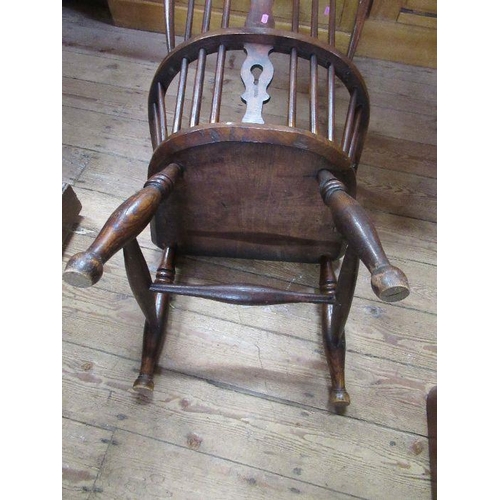 108 - Country yew wood  Windsor armchair, with pierced central splat, possibly cut down.