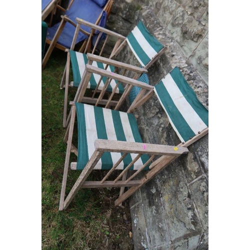 120 - A collection of garden furniture, to include director's chairs, folding sun loungers, green painted ... 