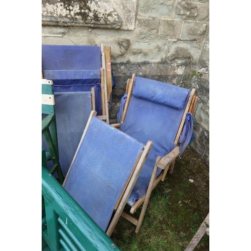 120 - A collection of garden furniture, to include director's chairs, folding sun loungers, green painted ... 