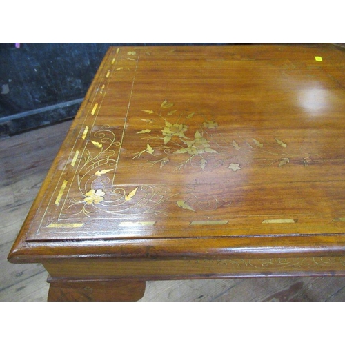 122 - A coffee table with metal inlay. Width 22 ins, height 18.5 inches