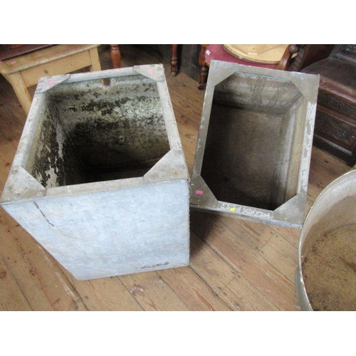 127b - A galvanised bath together with two galvanised water tanks