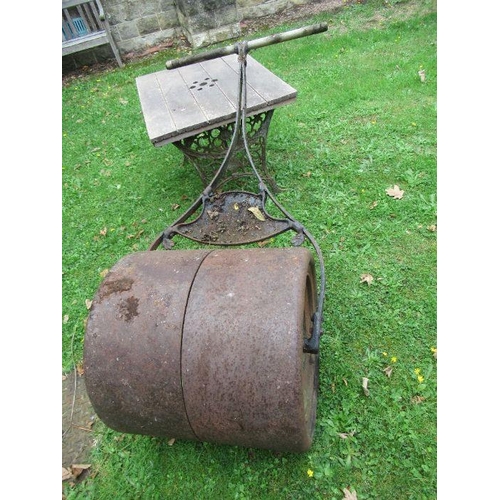 132 - A garden roller, width 24ins, together with a garden table, 39ins x 28ins