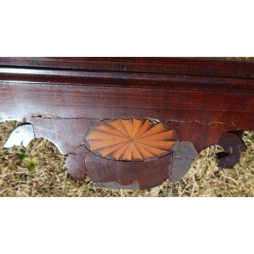 138 - An antique mahogany fret cut wall mirror, decorated with hoho bird, overall size 29.5ins x 16ins