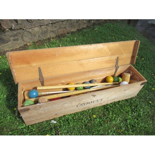 16 - A vintage croquet set,