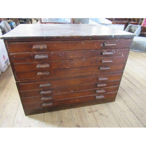 18 - A stained pine plan chest, fitted eight drawers, width 48ins, height 36ins, depth 35ins