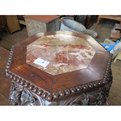 2 - An Oriental hardwood jardiniere stand, the octagonal top inset with marble and having a bead edge, t... 