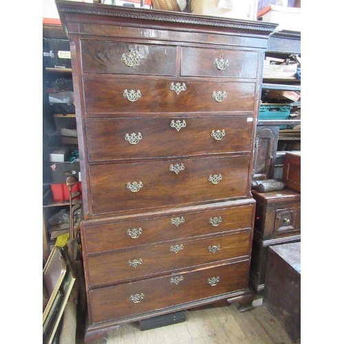 20 - A late Georgian mahogany chest on chest, the top section fitted two short drawers over three graduat... 