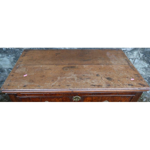 30 - An antique oak chest, of four long drawers with panelled fronts, 40.5ins x 23ins x height 37.5ins