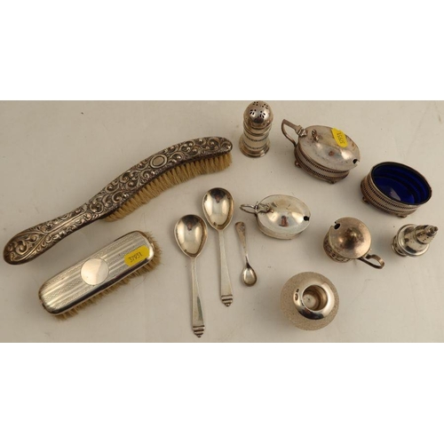 398 - A collection of hallmarked silver, to include match striker, condiments, spoons, crumb brush etc