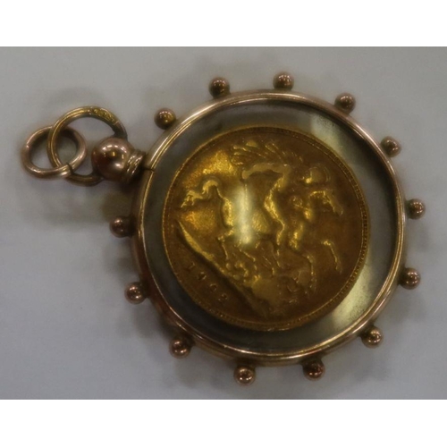 411 - A 1902 gold half sovereign, a gold and glass locket pendent