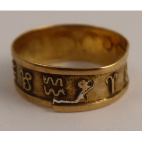 418 - A gold ring, decorated with signs of the zodiac, af, weight 1.9g