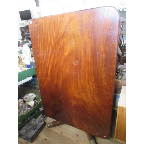 45 - A 19th century mahogany rectangular topped breakfast tilt top table, raised on a column with four ou... 