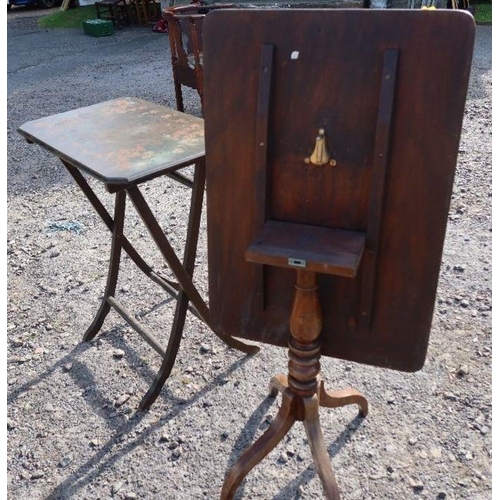 47 - A mahogany tilt top table, together with a folding table with poker work style decoration