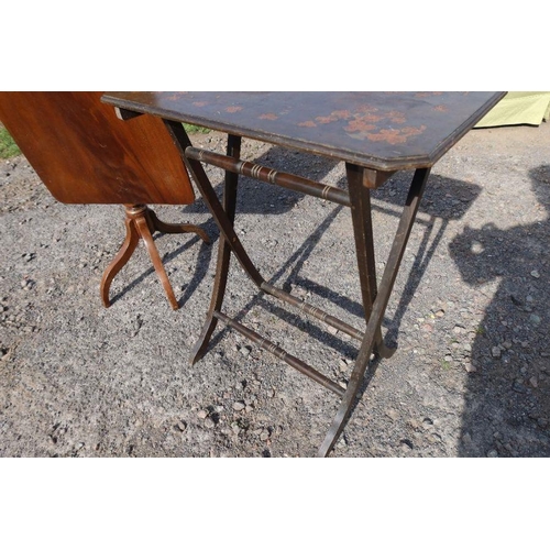 47 - A mahogany tilt top table, together with a folding table with poker work style decoration