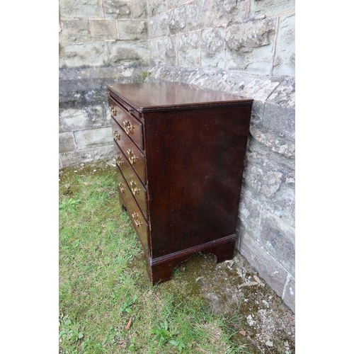 53 - A mahogany chest of drawers, fitted with a brushing slide, having four graduated long drawers, raise... 