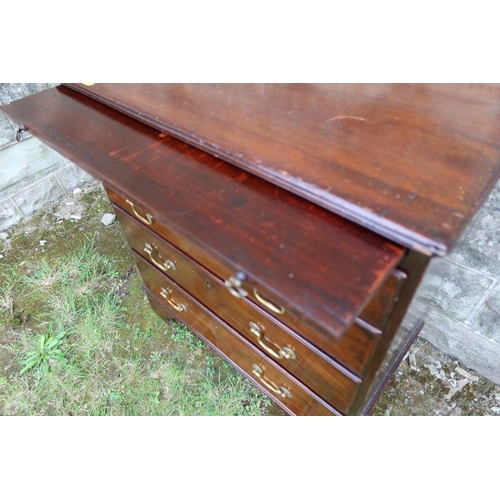 53 - A mahogany chest of drawers, fitted with a brushing slide, having four graduated long drawers, raise... 