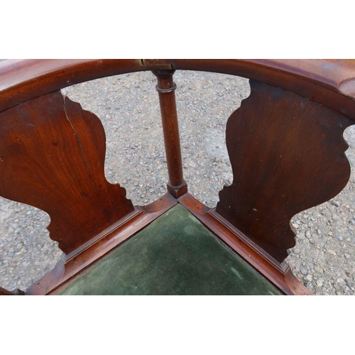 54 - A Georgian mahogany corner chair