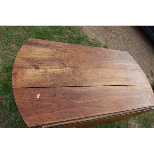 55 - A fruitwood kitchen table