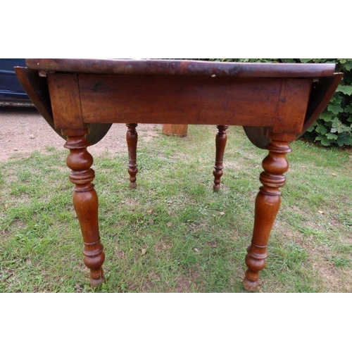 55 - A fruitwood kitchen table