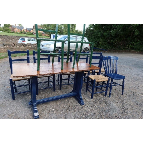 66 - A set of seven painted kitchen chairs with rush seats, together with another painted kitchen chair, ... 