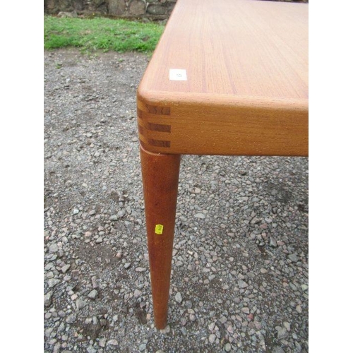 69 - A Danish Bramin extending dining table. Width 35ins, max length 77 ins.