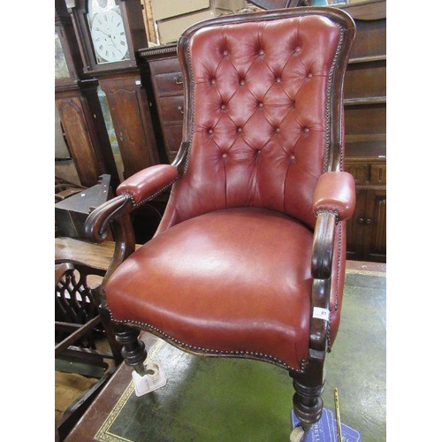 81 - A late Victorian/Edwardian showwood and leather open armchair.