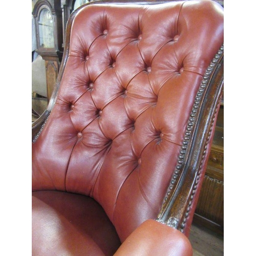 81 - A late Victorian/Edwardian showwood and leather open armchair.