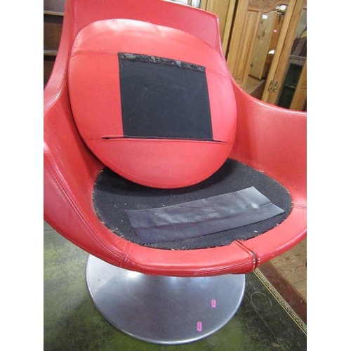 85 - A 20th century red leather swivel chair, raised on chrome base. Trade only.