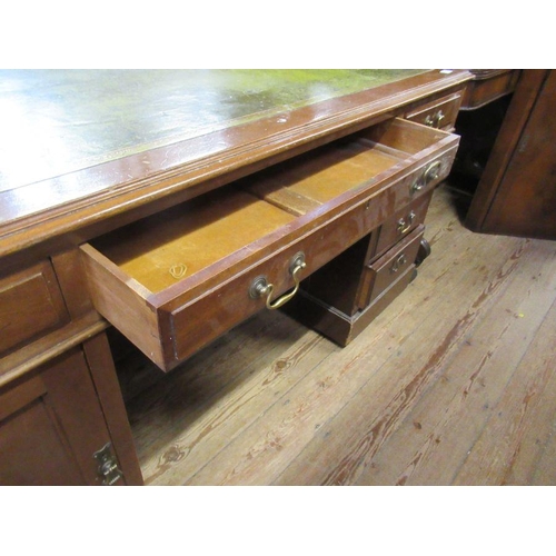 86 - A Georgian style mahogany partners desk, fitted frieze drawer to each side, flanked on one side by t... 