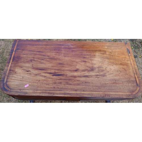 87 - A 19th century mahogany fold over tea table, raised on lyre ends, with inlaid brass and wood decorat... 