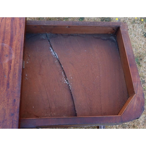 87 - A 19th century mahogany fold over tea table, raised on lyre ends, with inlaid brass and wood decorat... 